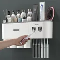 Porte-brosse à dents mural à absorption magnétique inversée Double porte-dentifrice automatique