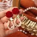 Boucles d'oreilles flocage de perles rouges pour femmes boucles d'oreilles papillon rose festival
