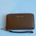 Michael Kors Bags | Michael Kors Mercer Wallet | Color: Brown/Gold | Size: Os