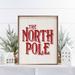 The Holiday Aisle® The North Pole White Wood in Red/White | 30 H x 24 W x 1.5 D in | Wayfair 556FECE57FD3422D8D2CA762C2F45DE6