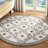 Blue 66 x 0.25 in Area Rug - Lark Manor™ Hollander Floral Handmade Tufted Wool Ivory Area Rug Wool | 66 W x 0.25 D in | Wayfair