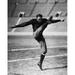 Football 20Th Century. /Nan Unidentified American Football Player Kicking The Ball Early 20Th Century. Poster Print by (18 x 24)
