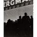 Silhouette of a group people standing outside a theater Poster Print (24 x 36)