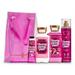 Bath and Body Works Twisted Peppermint Gift Bag Set Full Size Body Lotion Shower Gel Fragrance Mist and 1 oz Hand Cream arranged inside a transparent Gift Bag.