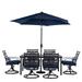 Hanover Montclair 7-Piece Dining Set in Navy Blue with 6 Swivel Rockers 40-In. x 66-In. Dining Table and 9-Ft. Umbrella