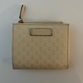 Gucci Bags | Gucci Gg Guccissima Leather Small Bifold Wallet- Ivory | Color: Cream | Size: Os