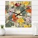 Designart 'Vintage Exotic Flowers In Orange and Yellow' Traditional wall clock