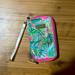 Lilly Pulitzer Bags | Lily Pulitzer Wristlet. Tropical Print Phone And Card Wristlet. | Color: Green/Orange | Size: Os