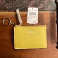 Coach Bags | Coach Mini Skinny Id Case - Gold/Mustard Yellow | Color: Gold/Yellow | Size: 4-1/4” Long X 3” High X 1/2” Wide