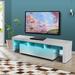 Orren Ellis Morden TV Stand w/ LED Lights Wood in Brown | Wayfair 5C7FC57889894161ACEA75D15E01F636