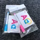 Carte d'apprentissage de l'alphabet avec un stylo lettre de lutte lecture et écriture cadeau