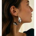 Anthropologie Jewelry | Anthropologie Twisted Metal Hoop Earrings | Color: Gold/Silver | Size: Various