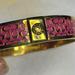 Coach Jewelry | Coach Gold Pink Metal Bangle Bracelet 1/2" Wide Stamped .......415 | Color: Gold/Pink | Size: Os