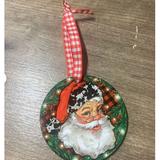 The Holiday Aisle® Beautiful Santa Holiday Shaped Ornament Ceramic/Porcelain in Green/Red/White | 0.4 D in | Wayfair