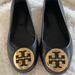 Tory Burch Shoes | Like New Tory Burch Black Leather Flat With Gold Emblem | Color: Black | Size: 7.5