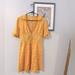 Urban Outfitters Dresses | Beautiful Yellow Floral Mini Dress | Color: Yellow | Size: M