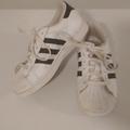 Adidas Shoes | Adidas Girl's White Leather Sneakers Black Stripes Size 1 | Color: Black/White | Size: 1g