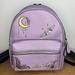 Coach Bags | Coach Mini Charlie Backpack With Chelsea Champlain Tattoo Lilac | Color: Black/Purple | Size: 7 1/2" (L) X 9 1/4" (H) X 3 3/4" (W)