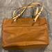 Michael Kors Bags | Michael Kors 2 Tone Bag With 4 Exterior Pockets -16in Top To Bottom, 11in Bottom | Color: Brown/Tan | Size: Os