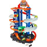 Hot Wheels City Ultimate Garage Track Set with 2 Toy Cars Garage Playset Features Multi-Level Racetrack Moving T-Rex Dino & Storage for 100+ 1:64 Scale Vehicles Toy Gift for Kids 3 Years & Older