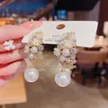 Boucles d'oreilles en perles de fleurs de style coréen pour femmes boucles d'oreilles DelTradus