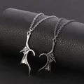 Une paire de pendentifs ailes de dragon en forme de cœur pour hommes et femmes collier vintage