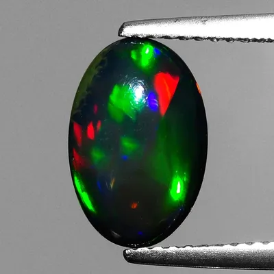 Cabochon naren opale noire naturelle magnifique pierre précieuse Ethiopienne 0.65 ct 5x7 3