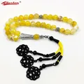 Collier musulman en Onyx naturel jaune blanc 33 perles avec pompon en métal noir accessoires