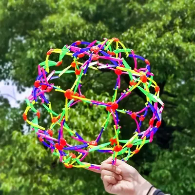 Balle Extensible et Magique pour Enfant et Bébé Jouet à Lancer Étirement Rétrécissement Sphère