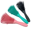 Brosse à cheveux pieuvre avec fonction de massage du cuir chevelu poignées cheveux bouclés ou