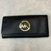 Michael Kors Bags | Michael Kors Leather Wallet | Color: Black/Gold | Size: Os