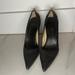 Gucci Shoes | Gucci Black Pointy Heels. Gucci Logo In The Back | Color: Black/Silver | Size: 9