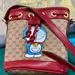 Gucci Bags | Gucci X Doraemon Bucket Gg Logo Monogram Bag Printed Canvas Mini Red | Color: Tan | Size: Mini