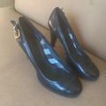 Burberry Shoes | Burberry Leather Buckle Pumps W/Plaid Accent Size 39/8 Women’s | Color: Black | Size: 8