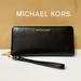 Michael Kors Bags | Michael Kors Jet Set Travel Large Continental Leather Wallet Black/Gold | Color: Black | Size: Os