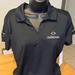 Nike Tops | Gulfstream Logo Nike Black Short Sleeve Polo Shirt Women's Size L | Color: Black | Size: L