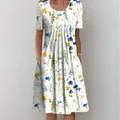 Robe d'été à col rond manches courtes grand ourlet imprimé floral pull ample longueur aux