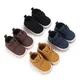 Chaussures de premiers pas pour bébés semelle en caoutchouc souple en cuir PU pantoufles