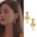 Boucles d'oreilles fleur d'or Song Zhiya pour femmes et filles être célibataire c'est l'enfer