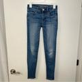 American Eagle Outfitters Jeans | American Eagle Super Stretch Jegging Skinny Jeans Medium Wash Blue Jean Size 0 | Color: Blue | Size: 0