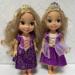 Disney Toys | Lot Of 2 Disney Tangled Rapunzel My Frist Doll Toddler Dolls W/Dresses | Color: Red/Tan | Size: Osg