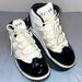 Nike Shoes | Kids Air Jordan Sneaker Size 1 1/2. White And Black | Color: Black/Purple/White | Size: 1.5b