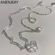 ANENJERY – collier en chaîne asymétrique pour femme couleur argent Texture lave cœur perle