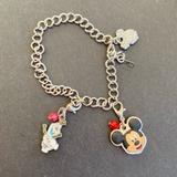 Disney Jewelry | Disney Silver Toned Charm Bracelet Featuring Mickey Mouse And Olaf | Color: Silver | Size: Os