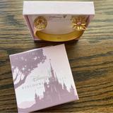 Disney Accessories | Disney Kingdoms & Castles Small World Bracelet | Color: Gold/White | Size: Os