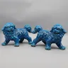 Statues de lions qui marchent chiens foo paire de lions gardiens