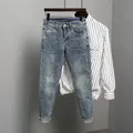 Jeans en denim slim pour hommes vêtements de cow-boy streetwear coréen jeans assiste de luxe