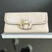 Coach Bags | Cream Coach Leather Wallet With Dark Brown Leather Piping/Trim | Color: Cream | Size: 7 1/2 X 3 1/2 X 1 1/2 Inches