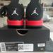 Nike Shoes | Jordan Kids Air Jordan 4 Retro “Red Thunder” Sneakers | Color: Black/Red | Size: 11b