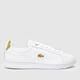 Lacoste carnaby pro leather trainers in white & gold